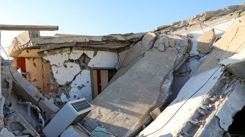 Libyen im Krieg: Zerstörte Gebäude nach einem Granatenangriff auf ein Wohngebiet im Bezirk Abu Slim südlich von Tripolis Ende März 2020.