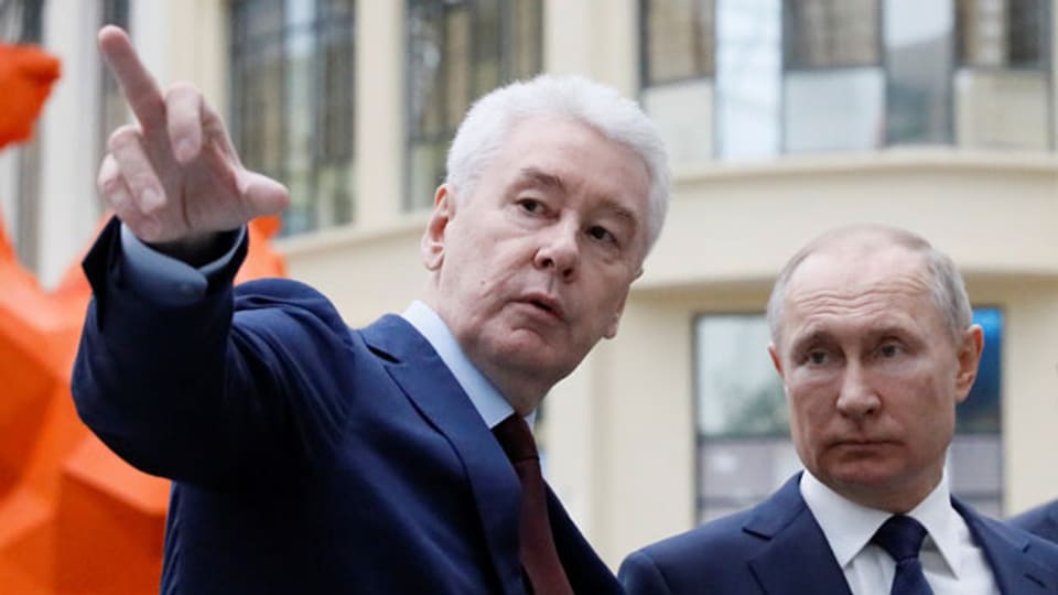 Der russische Präsident Wladimir Putin (rechts) und der Bürgermeister von Moskau Sergej Sobjanin.