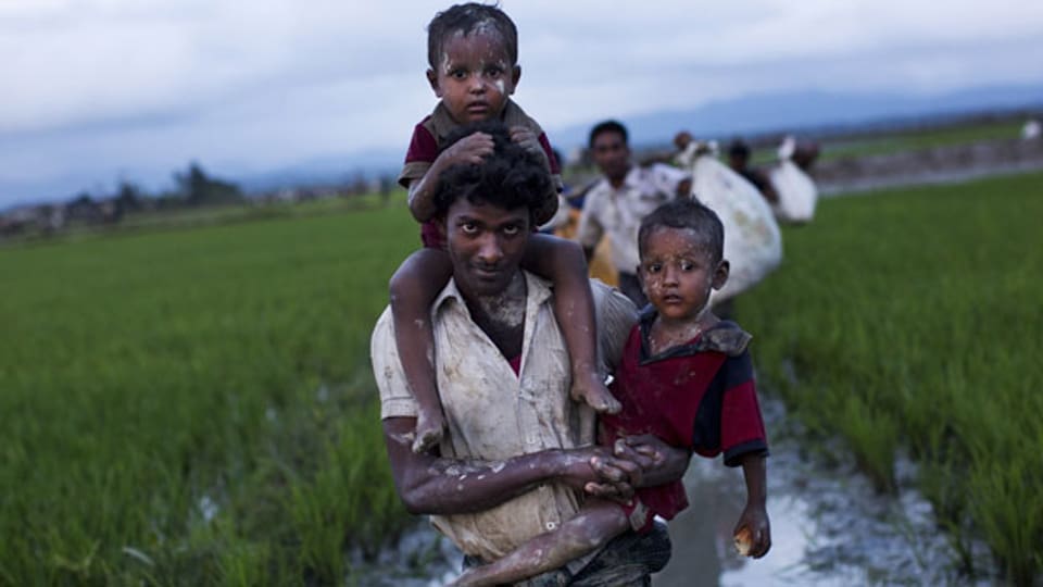 Angehörige der ethnischen Minderheit der Rohingya in Myanmar auf der Flucht.