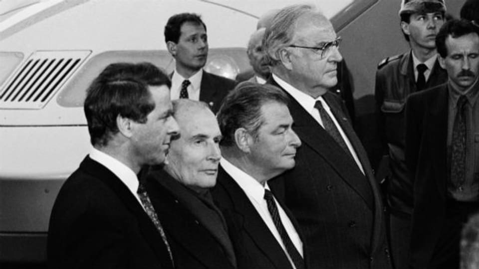 Dreiländertreffen zum 25-jährigen Bestehen 1989: Adolf Ogi, François Mitterand, Jean-Pascal Delamuraz und Helmut Kohl (v.l.n.r.).