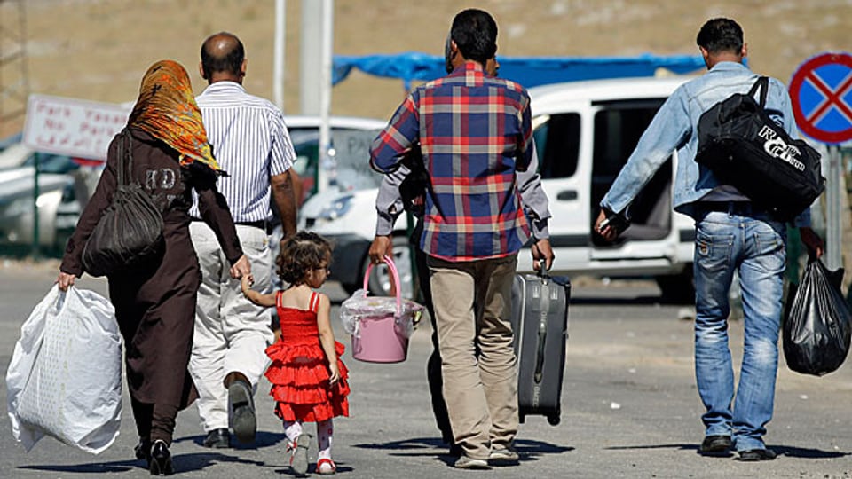Flüchtlinge an der syrisch-türkischen Grenze. Viele von ihnen sind völlig mittellos.