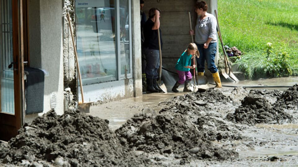 Aufräumarbeiten in Bumbach im Emmental nach dem verheerenden Unwetter vom 24. Juli 2014.