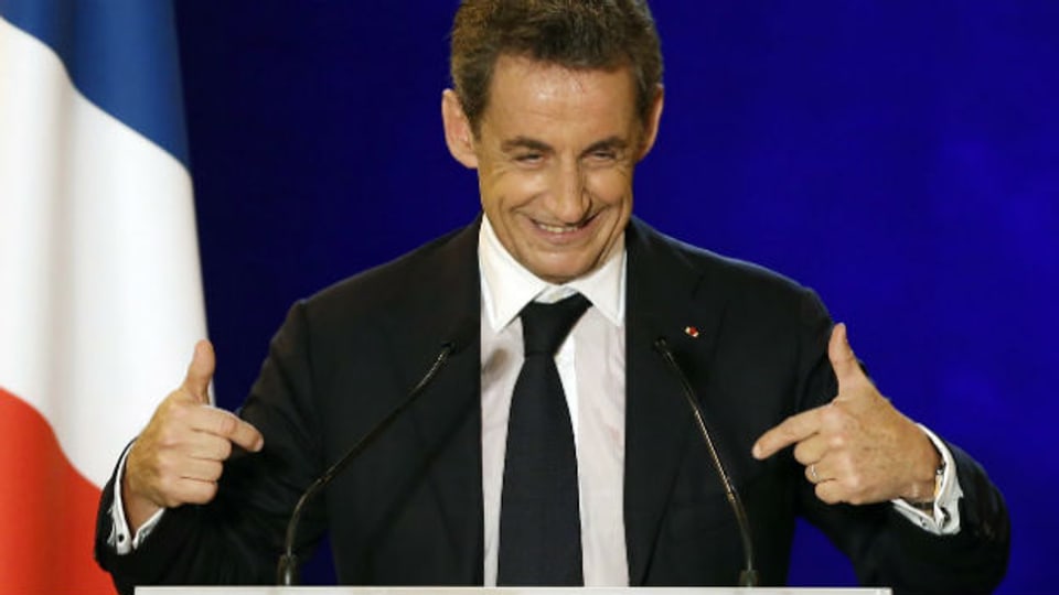 Frankreichs früherer Präsident Sarkozy kann sich freuen - er dürfte Parteichef der UMP werden.
