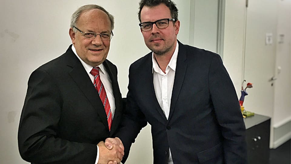 Bundespräsident Johann Schneider Ammann mit Marc Lehmann von Radio SRF.