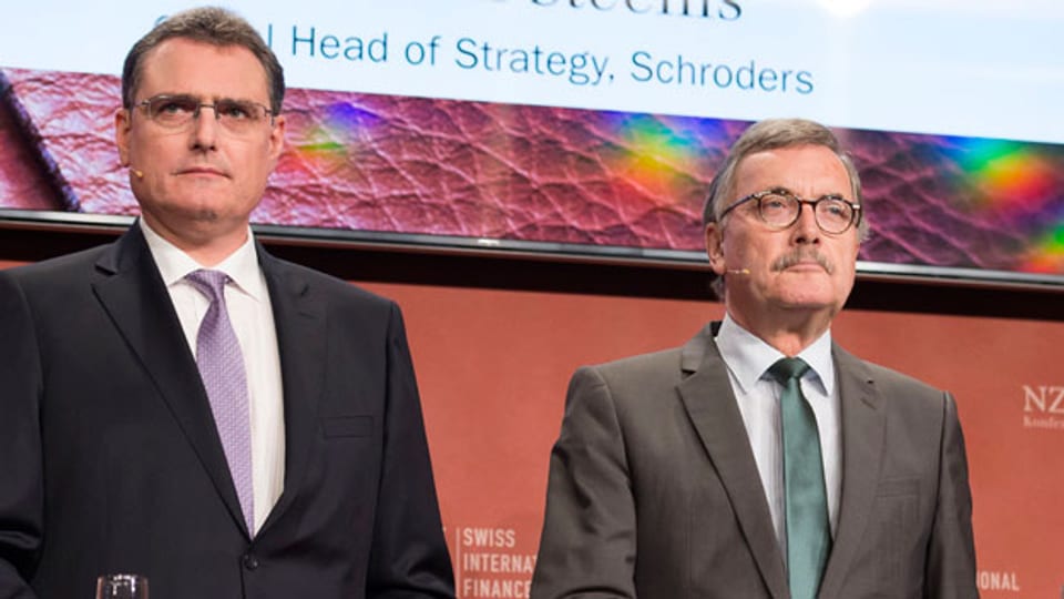 Thomas Jordan, Präsident Schweizerische Nationalbank  (links) und  Jürgen Stark, ehemaliger Chefökonomen der EZB.