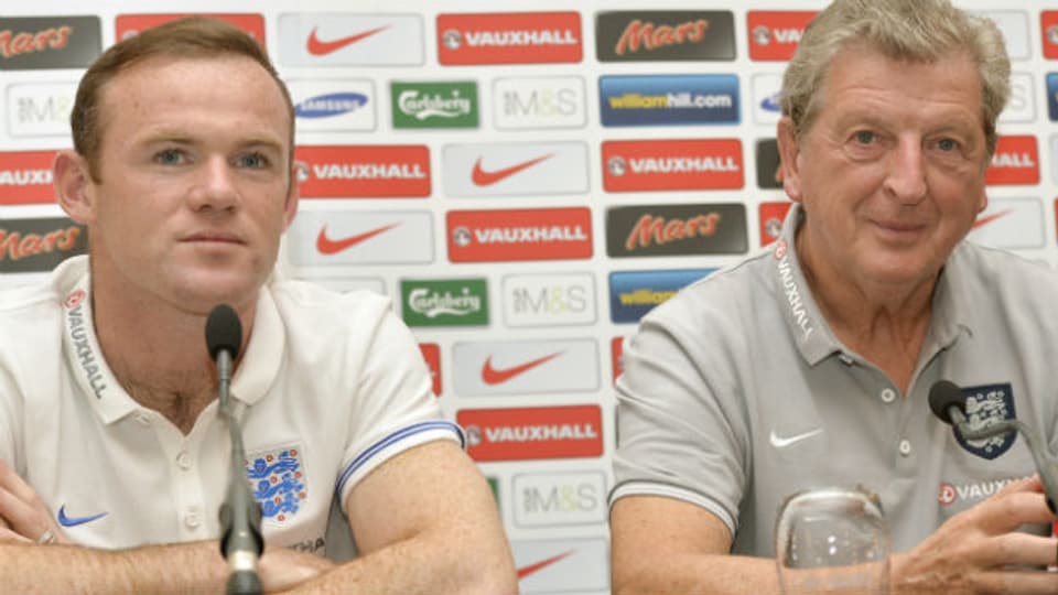 Wayne Rooney und Roy Hodgson an der Pressekonferenz in Basel.