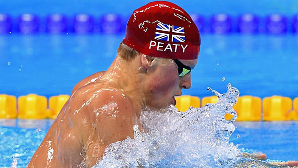 In Rio purzeln die Schwimmrekorde gleich reihenweise – und nähren Spekulationen. Bild: Der britische Schwimmer Adam Peaty in Rio auf dem Weg zu einem neuen Weltrekord.