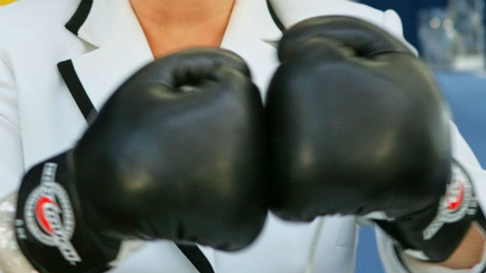 Hart gepolsterte Schläge: Boxhandschuhe