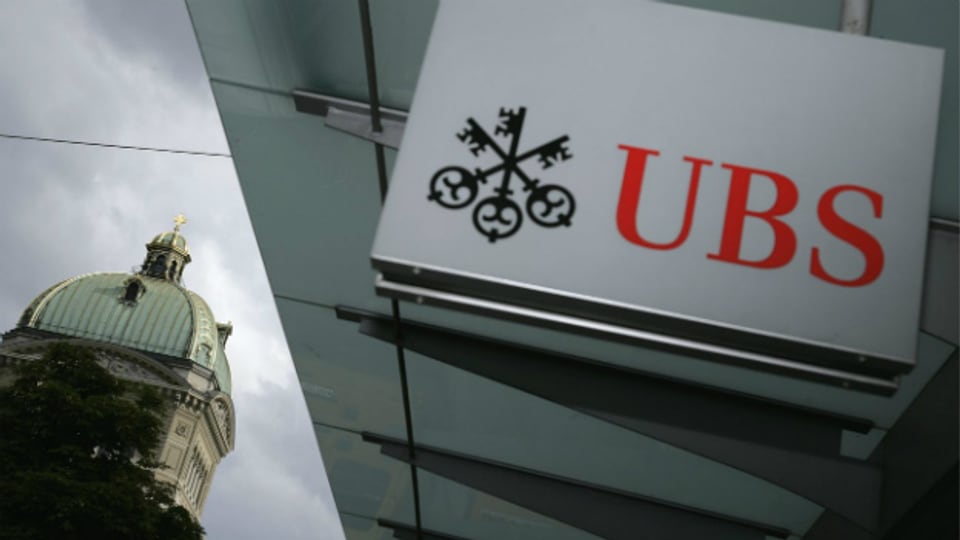 Politiker forderen eine Aufspaltung der UBS, die Bank plant nun eine Auslagerung.