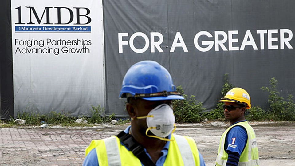 «1MDB – Forging Partnerships. Advancing Growth». Steht auf dem Werbebanner in Kuala Lumpur, der Hauptstadt Malaysias.
