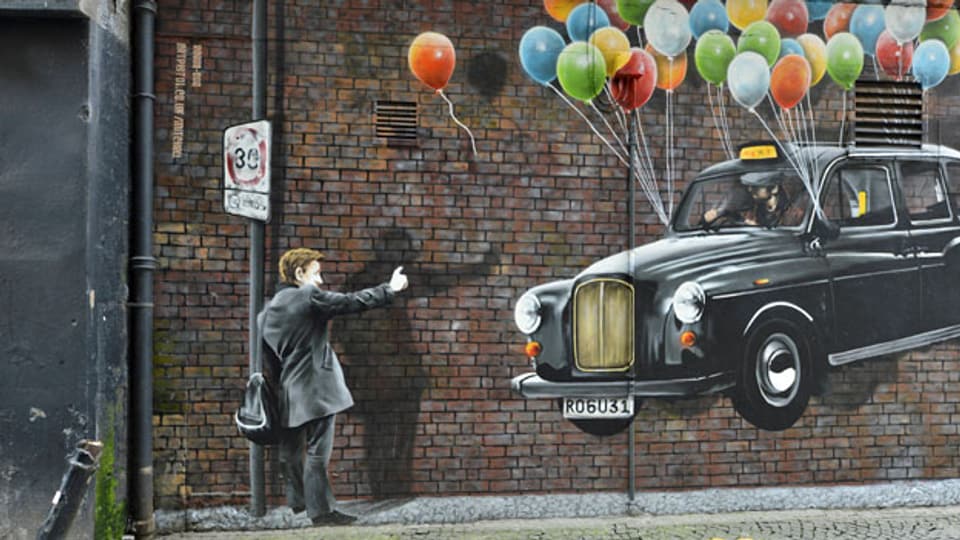 Werden fliegende Taxis schon bald Realität? Wandgraffiti in Glasgow.