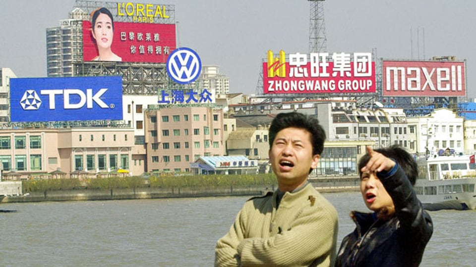 Werbetafeln in Shanghai. Symbolbild
