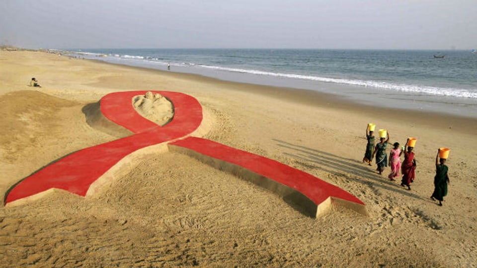 Sandskulptur in Indien zum Welt-Aids-Tag am 1.12.2012