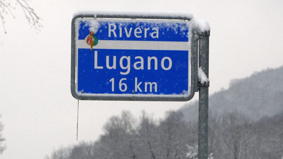 Auf welchen Punkt in Lugano beziehen sich die angegebenen 16 Kilometer?