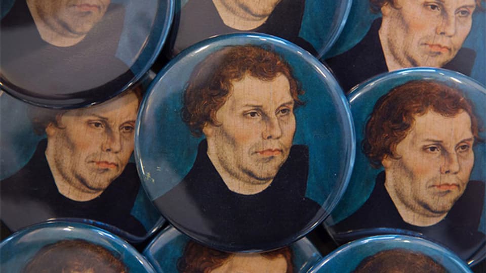 Magneten mit dem Porträt Martin Luthers aus einem Cranach-Gemälde.