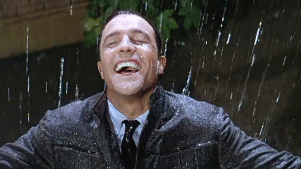 Gene Kelly geniesst den Regen in «Singing in the Rain».