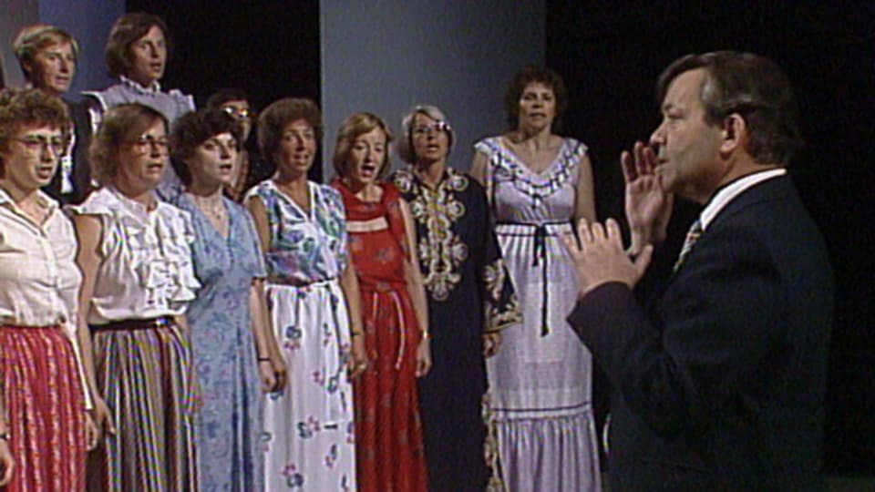 Luzerner Singer mit ihrem Dirigenten Hansruedi Willisegger, aus der Sendung «Treffpunkt» 1982.