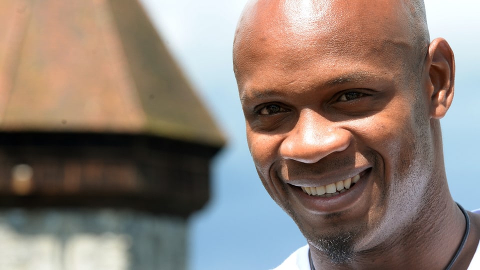 Asafa Powell vor dem Wasserturm in Luzern.