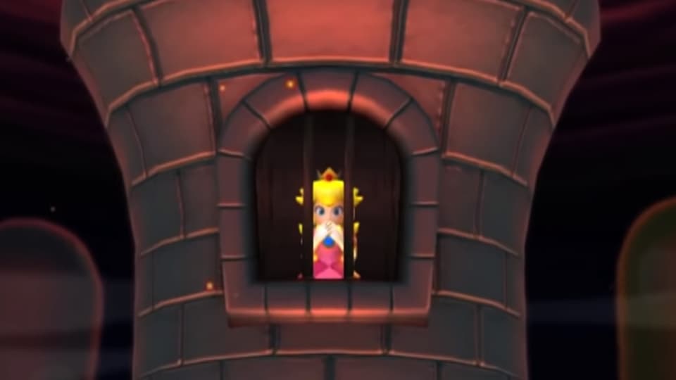 Princess Peach wartet in einem Turm hinter Gittern auf ihren Retter.