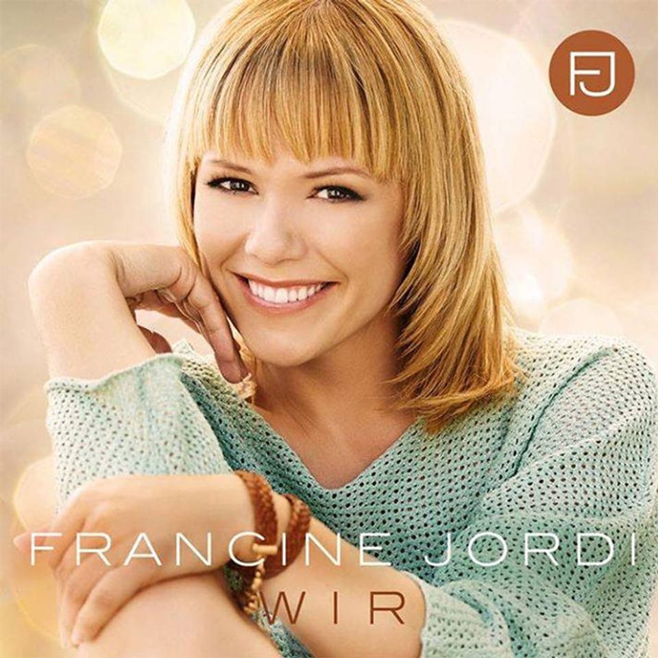 Die blondhaarige Sängerin trägt auf dem CD-Cover einen hellblauen Pullover.
