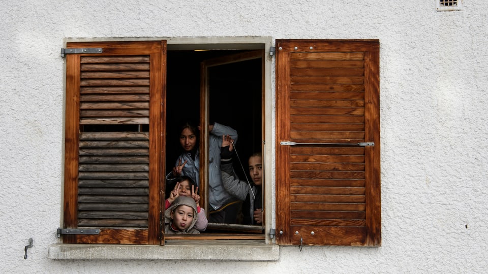 Eine Flüchtlingsfamilie in einer Einrichtung bei Villars-sur-Ollon.