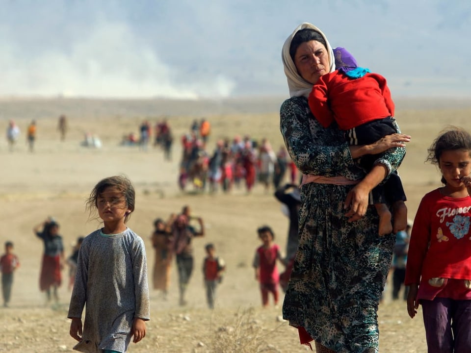 Jesiden flüchten 2014 vor dem IS