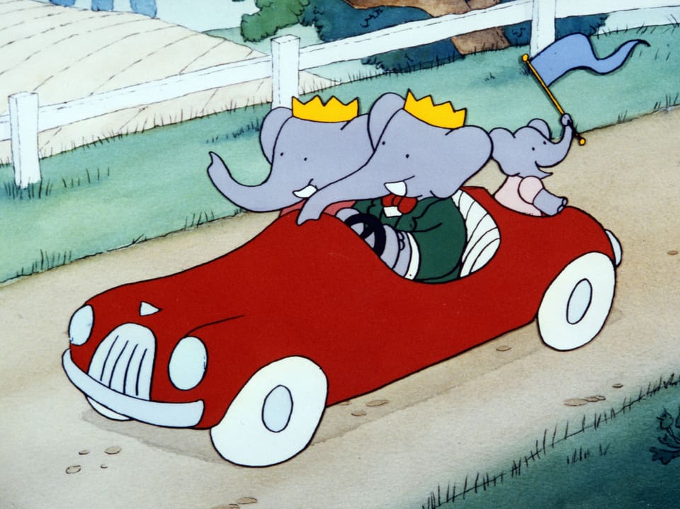 Drei Elefanten fahren in einem roten Wagen.