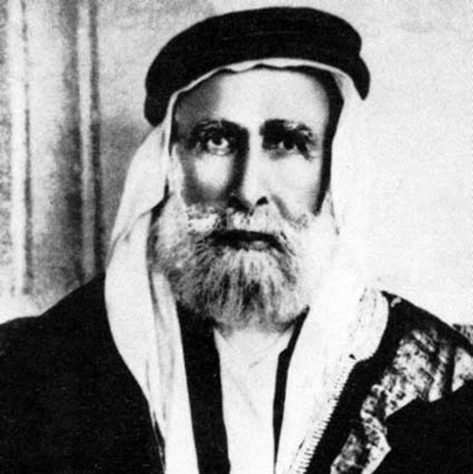Altes Schwarz-Weiss-Foto: Hussein ibn Ali mit Kopftuch und Bart