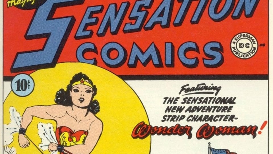 Wonder Woman stürmt nach vorne, während Gangster auf sie schiessen.
