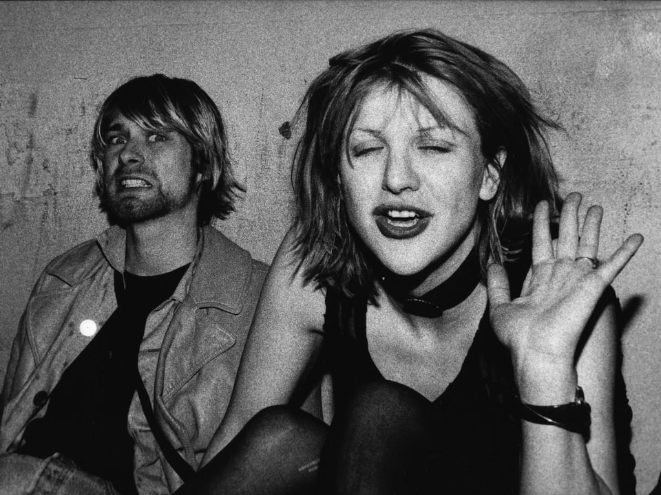 Kurt Cobain und Courtney Love machen Grimassen