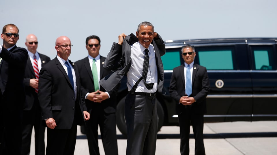 Barack Obama und Mitarbeiter des Secret Service.
