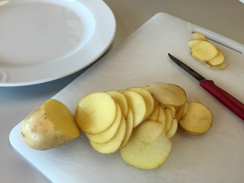 Kartoffeln in Scheiben geschnitten.
