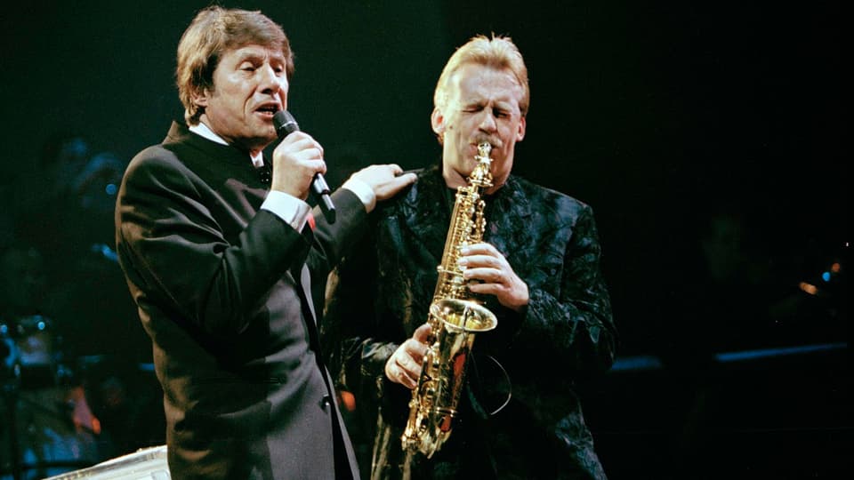 Pepe Lienhard und Udo Jürgens auf der Bühne. 