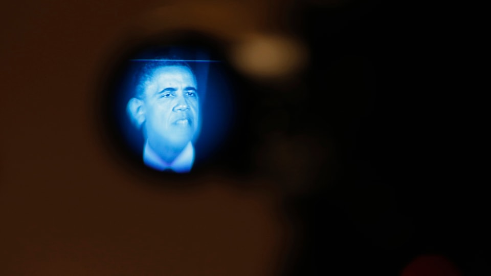 Präsident Barack Obama in einer Linse einer Kamera.