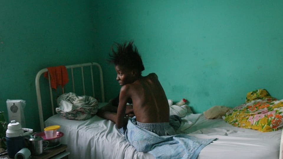 Aids-kranke Frau auf Haiti