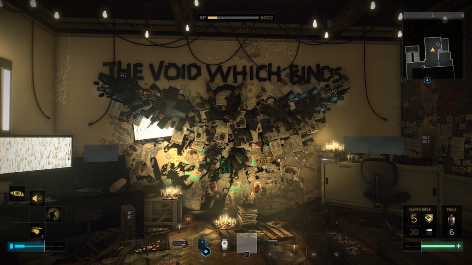 Eine Wand mit einem gestalteten Vogel und der Aufschrift "The Void Which Binds"