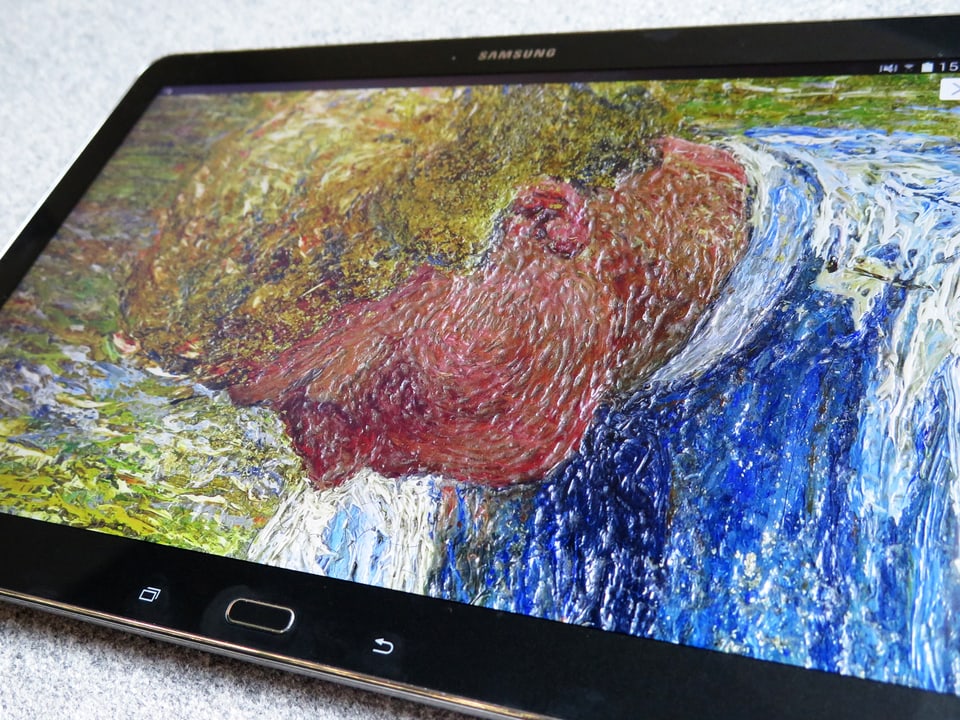 Ein Tablet zeigt ein Gemälde mit dem Kopf eines Hirtenjungen.