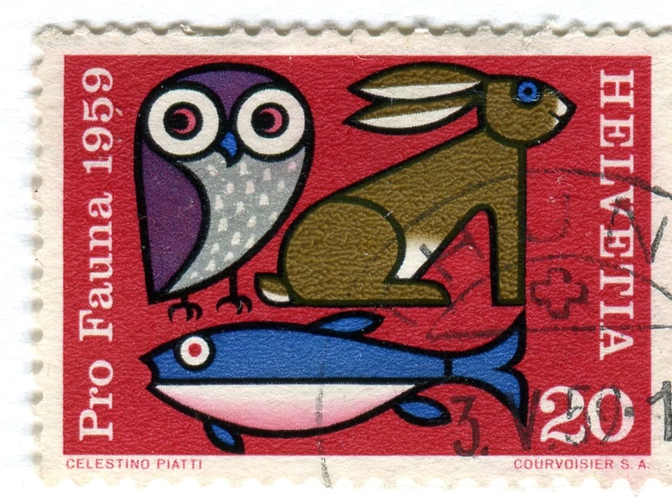 eine Briefmarke mit einer Eule, einem Hasen und einem Wal