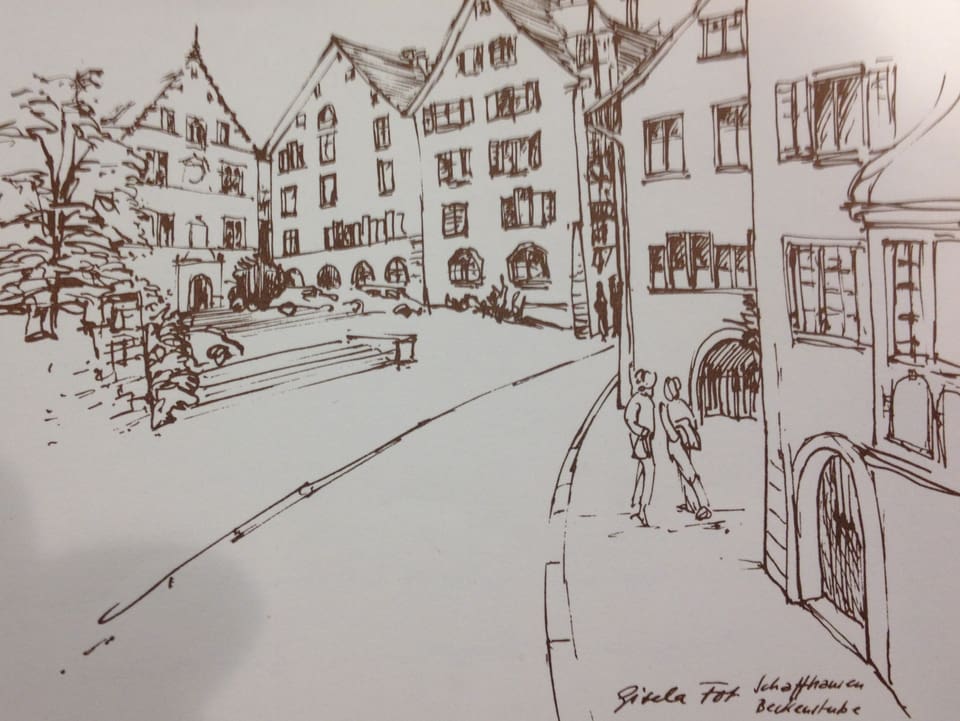 Zeichnung mit Häusern und Dorfplatz.
