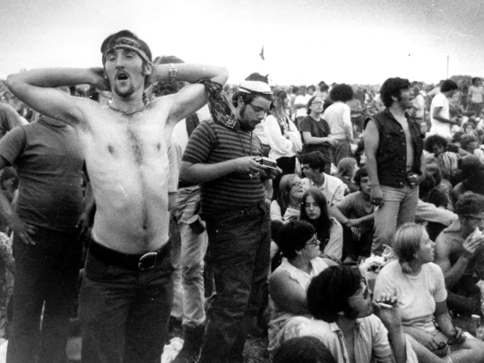 Müde Besucher des Woodstock-Festivals