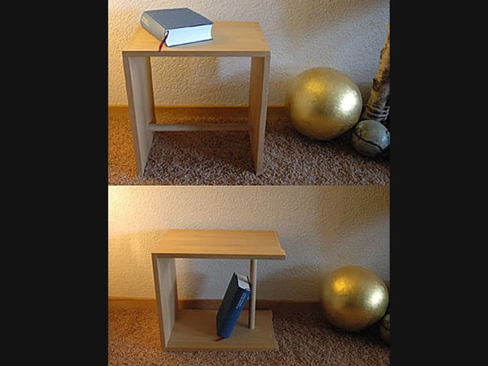 Ulmer Hocker aus Holz mit Buch darauf als Nachttisch und mit Buch darin als Regal.