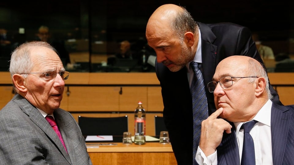Wolfgang Schäuble, EU-Währungskommissar Pierre Moscovici und Frankreichs Finanzminister Michel Sapin.
