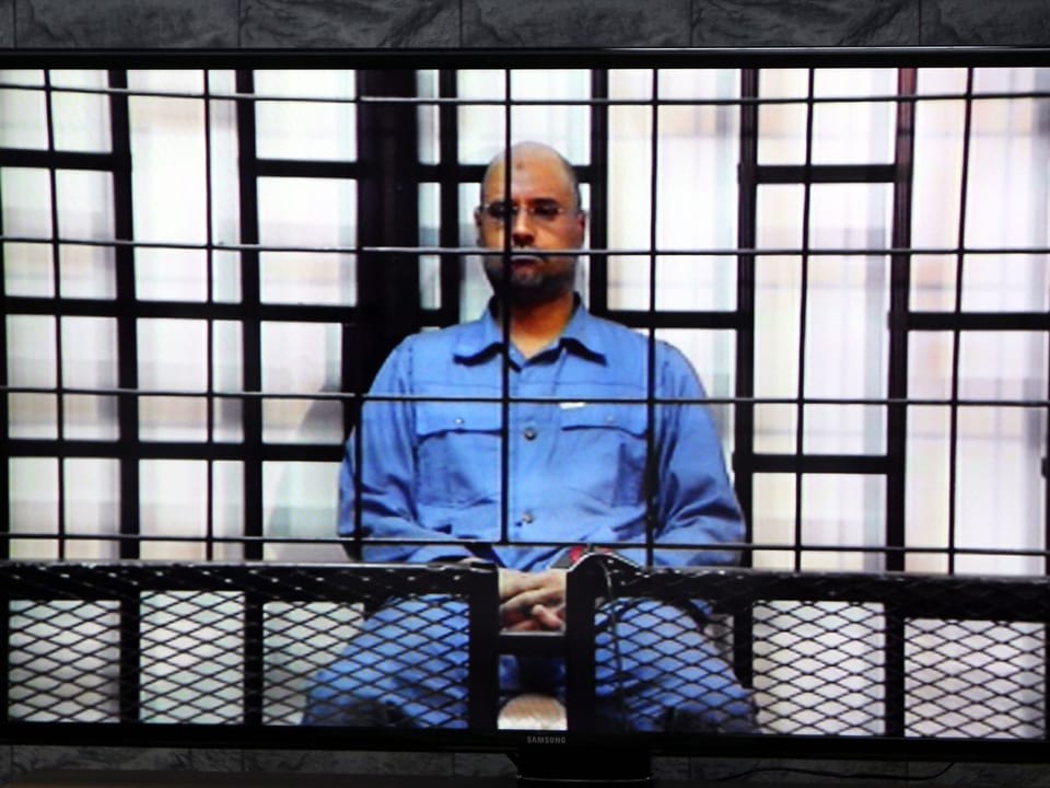 Saif al-Islam hinter einem Gitter / Videoscreenshot