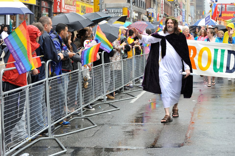 Man dressed as Jesus in Pride