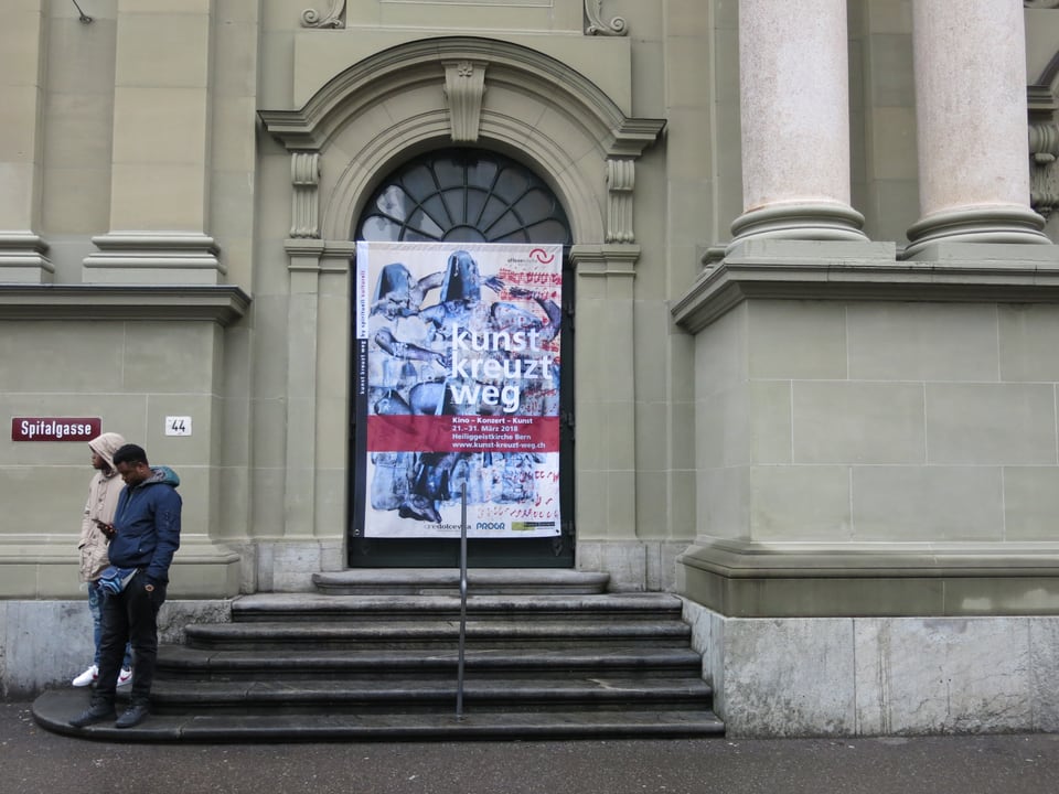 Plakat an der Türe zur Kirche Heiliggeist in Bern. 