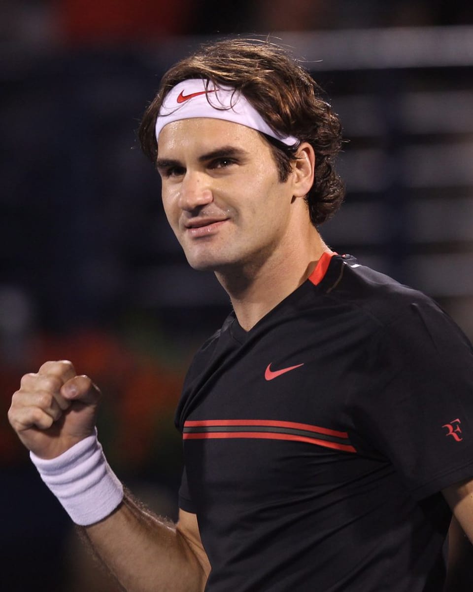 Federer jubelt über den Sieg in Dubai 2012. 