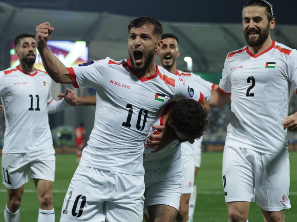Palästinas Spieler bejubeln den Sieg