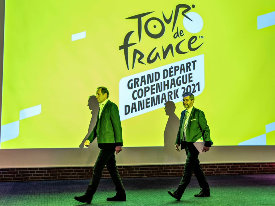 Organisatoren der Tour de France bei einer Präsentation.