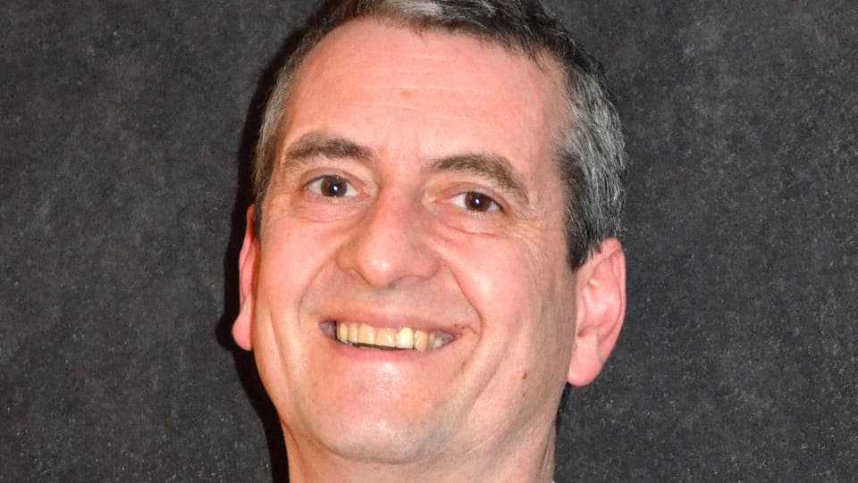 Portrait des IVR-Direktors Martin Gappisch, lachend.