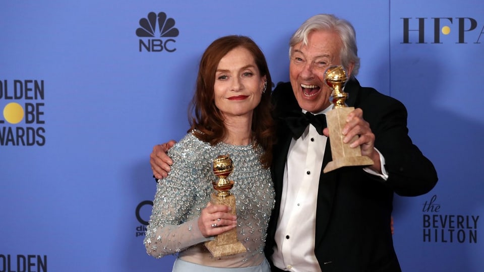 Isabelle Huppert und Paul Verhoeven mit Golden Globes